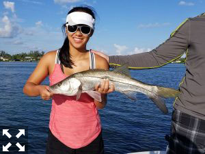 That's one nice looking Snook this young lady is holding.