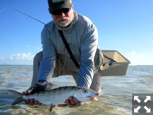 Capt. Rick Grassett with a South Andros bonefish caught and released on a fly while fishing out of Mars Bay Bonefish Lodge.