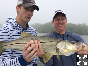 Ken Mackenzie and his son Mason, from Chicago, with a nice looking snook.