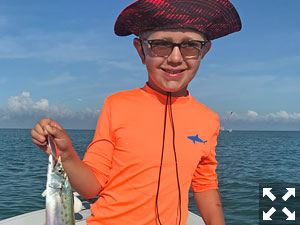 Kellen with one of the  many mackerel he caught.