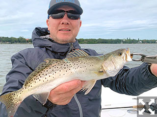 Brian Nafzinger, from Rehobeth, DE, with a trout caught and released on a CAL jig with a Shad tail while fishing Little Sarasota Bay with Capt. Rick Grassett.