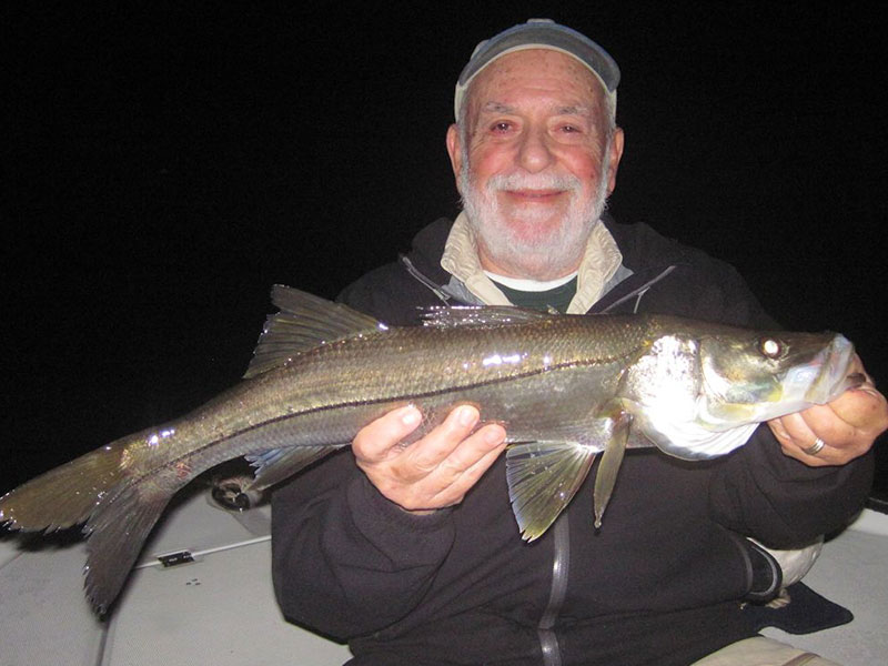 Night snook fishing is usually good through the winter months as long as water temperatures aren't too cold. Sarasota winter resident, Martin Marlowe, caught and released this snook on a Grassett Snook Minnow fly while fishing the ICW at night with Capt. Rick Grassett in a previous January.