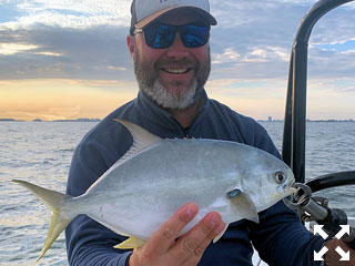 There should be good action on deep grass flats in January, Dylan Lewis, from CO, caught and released this pompano on a Clouser fly while fishing Sarasota Bay with Capt. Rick Grassett in a previous January.