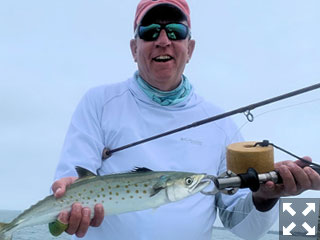 Tom Keir, from OH, with a Spanish mackerel caught and released on a Clouser fly while fishing Sarasota Bay with Capt. Rick Grassett recently.