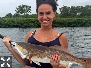 Rachel had never caught a red fish before this trip.