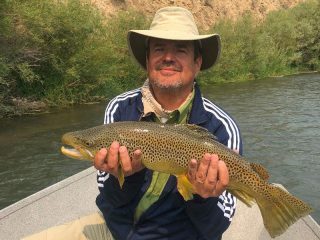 Nick Delle Donne, from PA, with a nice brown trout caught and released on a fly while fishing with King Outfitters out of Dillon, MT recently.