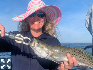 Shara King, from Dillon, MT, had good action catching and releasing trout on flies and DOA Lures while fishing in Sarasota with Capt. Rick Grassett.