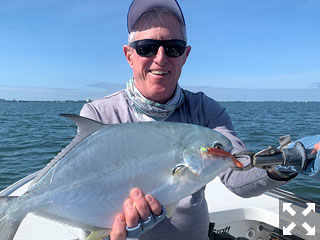 Marshall Dinerman, from Lido, fished a deep flat to catch and release this pompano in shallow water on a CAL jig with a shad tail fishing Sarasota Bay with Capt. Rick Grassett in a previous November.