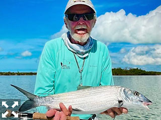 Rusty Chinnis, from Longboat Key, with a South Andros bonefish caught and released while fishing out of Mars Bay Bonefish Lodge.