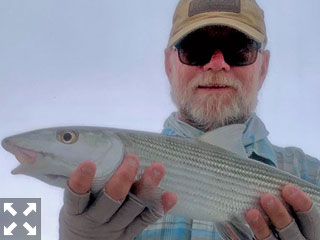 Capt. Rick Grassett with a South Andros bonefish caught and released while fishing out of Mars Bay Bonefish Lodge.