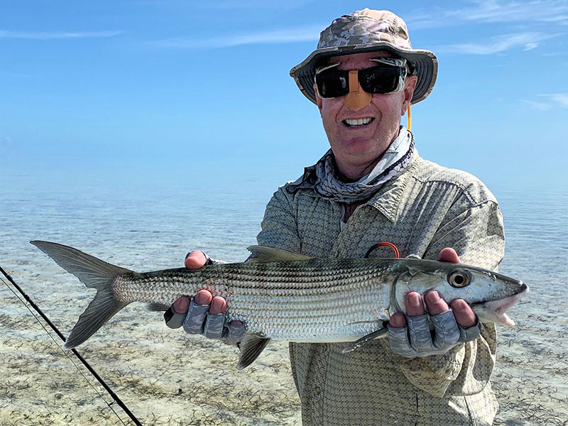 Tracy Baker, from NC, with a South Andros bonefish caught and released while fishing out of Mars Bay Bonefish Lodge.