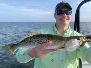 Will Patterson, from Raleigh, NC, with a nice trout, he caught and released on CAL jigs with a variety of tails while fishing Sarasota Bay.