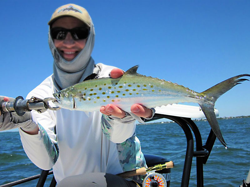 Mat Schenk, from CO, with a Spanish mackerel caught and released on Clouser flies on a couple of trips with Capt. Rick Grassett in a previous April.