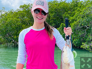 Lauren from Atlanta caught this beautiful redfish and some nice mangrove snapper while fishing a 1/2 day trip out of CBs outfitters!
