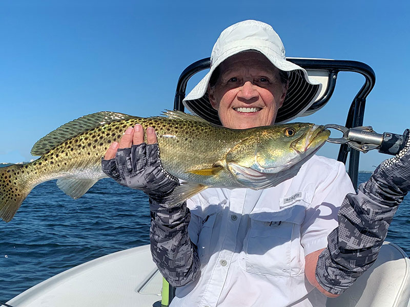 There should be a lot of variety on deep grass flats during September. Pat Beckwith, from Sarasota with a nice trout caught and released on a fly she tied while fishing Sarasota Bay with Capt. Rick Grassett in a previous September.