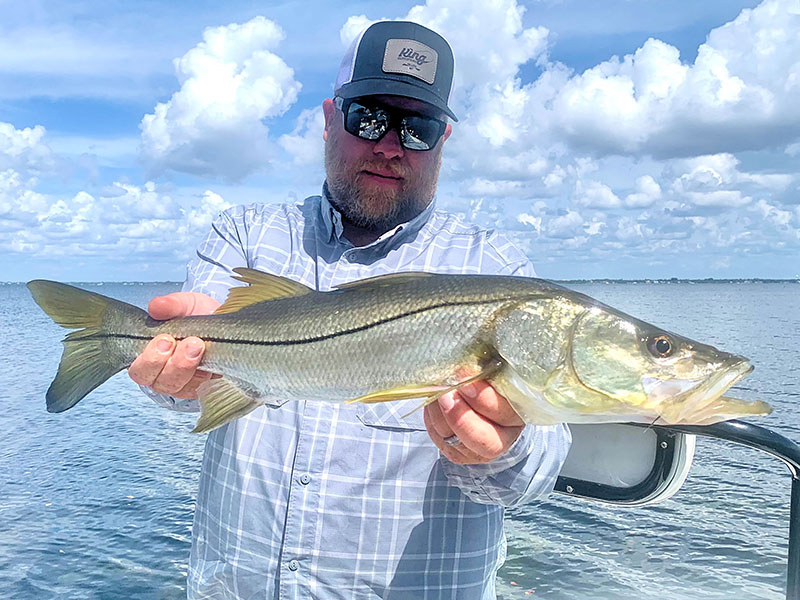 Dave King, owner of King Outfitters in Dillon, MT, with a nice snook caught and released on a fly while fishing with Capt. Rick Grassett in a previous October.