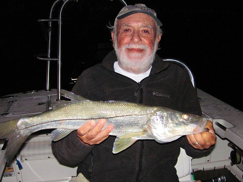 Martin Marlow, from NY, with a snook caught and released on a fly while fishing with Capt. Rick Grassett in a previous February. 