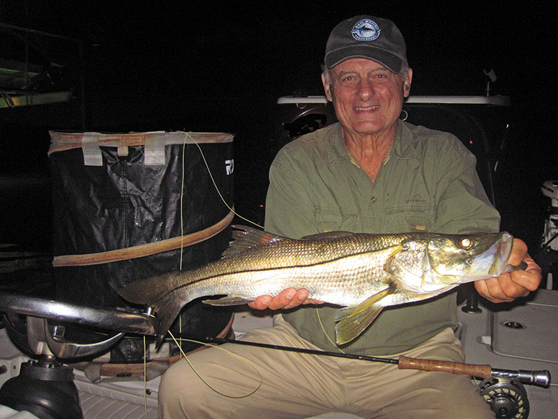 Frank Zaffino, with a snook caught and released on a fly while fishing the ICW at night in a previous April with Capt. Rick Grassett.