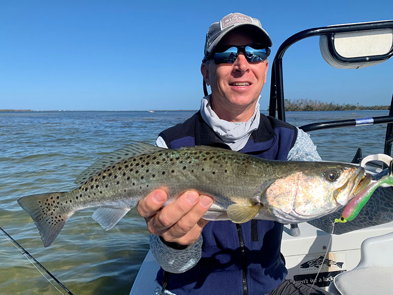 Dave Reinhart, from Pittsfield, MA, with a Trout caught and released on CAL jigs with shad tails while fishing Gasparilla Sound with Capt. Rick Grassett.