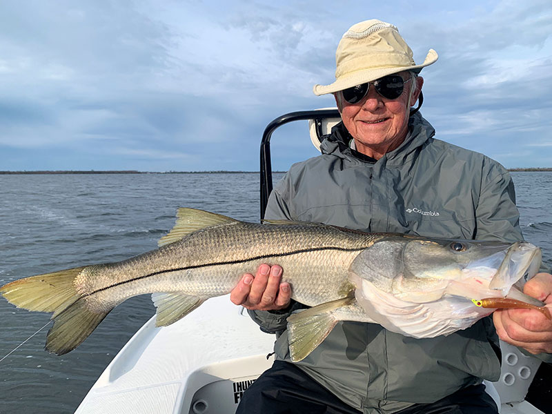 Keith McClintock, from Lake Forest, IL, with a 34" snook, caught and released on CAL jigs with shad tails while fishing Gasparilla Sound with Capt. Rick Grassett on several trips recently.