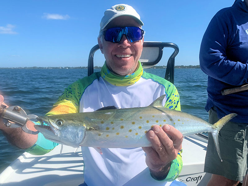Joe Brinkmeyer, from Siesta Key, with a Spanish mackerel caught and released on CAL jigs with shad tails fishing the deep grass flats of Sarasota Bay with Capt. Rick Grassett recently.