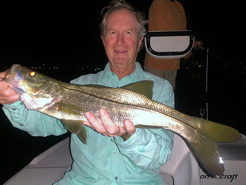 Fred Weeman, from Sarasota, with a snook caught and released on a fly while fishing the ICW at night with Capt. Rick Grassett recently.