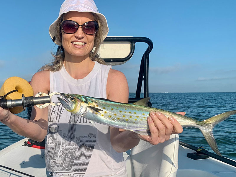 Andrea Zaffino, from Rochester, NY  with a Spanish mackerel caught and released on flies while fishing Sarasota Bay with Capt. Rick Grassett.
