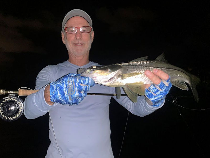 Richard Weintraub, from Sarasota, with his first snook caught on a fly while fishing in Sarasota with Capt. Rick Grassett recently.