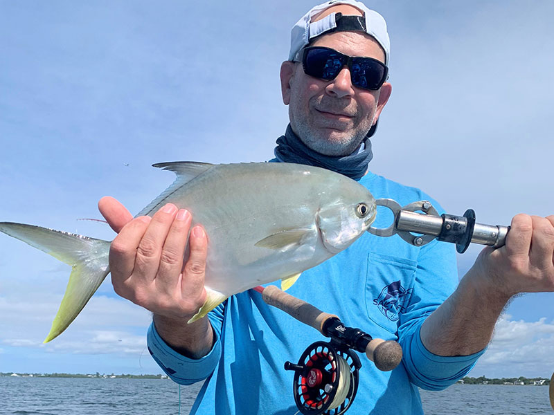 Massimo Giardina, from Switzerland, with a pompano. There should be good fly fishing action for a variety of species during October.