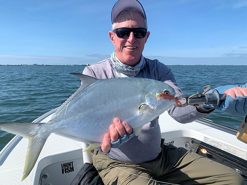 Fishing should be good in inshore waters during November. Marshall Dinerman, from Lido Key, with a pompano caught and released on CAL jigs with shad tails while fishing with Capt. Rick Grassett in a previous November.
