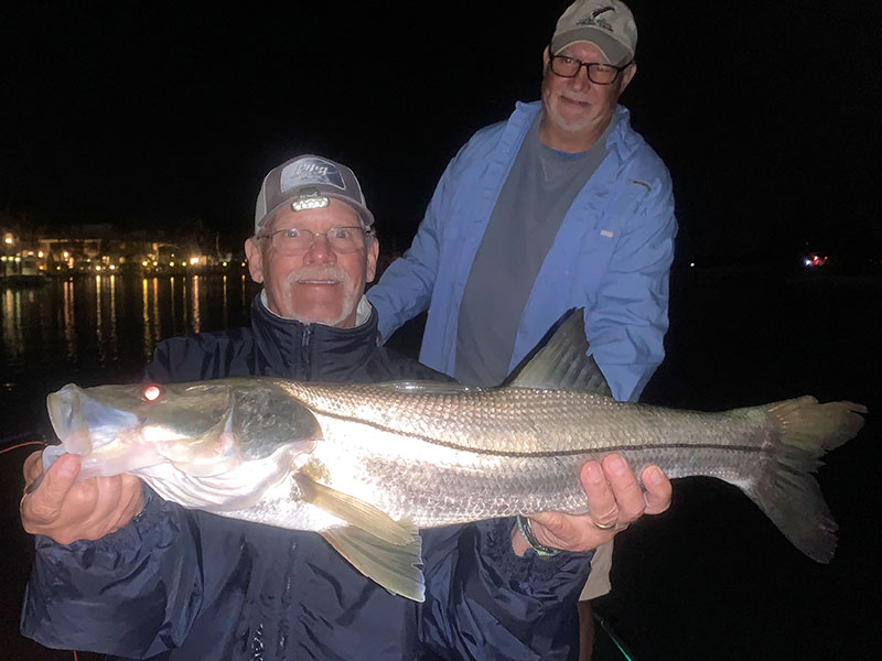 Fly fishing the ICW at night should be a good option in Feb as long as water temperature isn't too cold. Mike Perez, from Sarasota, with a nice snook  caught and released on a fly while fishing with Capt. Rick Grassett in a previous February.