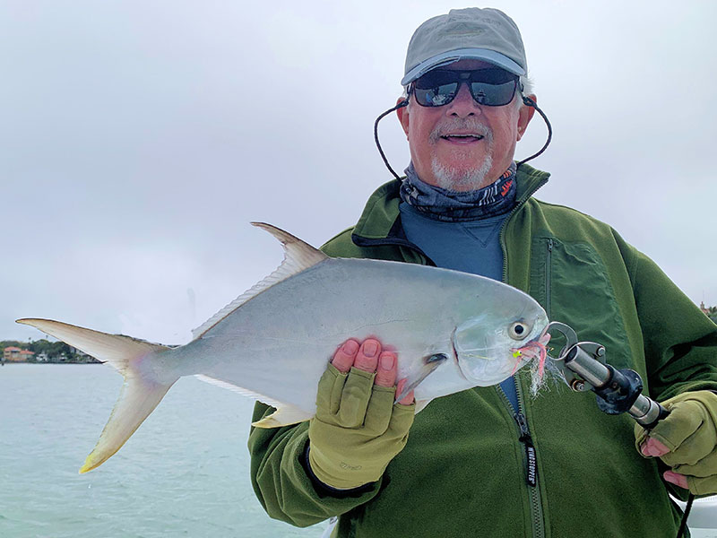 There should be good variety on deep grass flats during Feb. Bill Morrison, from Anna Maria Island, with a nice pompano caught on a fly while fishing Sarasota Bay with Capt. Rick Grassett in a previous February.
