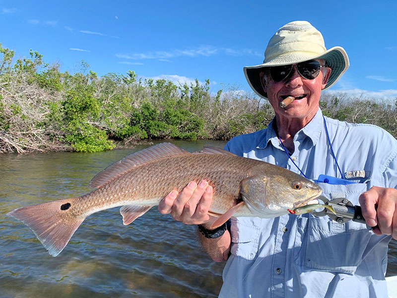 Keith McClintock, from Lake Forest, IL, with a nice red caught and released on a CAL jig with a shad tail while fishing Gasparilla Sound near Boca Grande with Capt. Rick Grassett on a couple of different trips in previous Februarys.