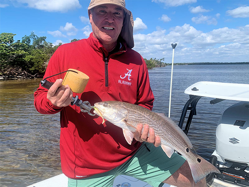 Stephen Liska, from Naples, with a red caught on CAL jigs with shad tails while fishing Gasparilla Sound with Capt. Rick Grassett recently.
