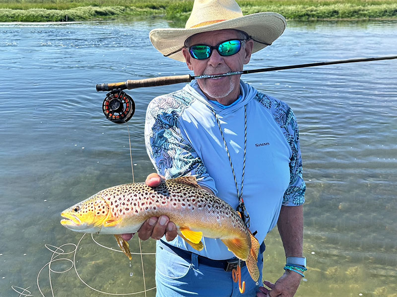 Mike Perez, from Sarasota, with a Montana brown trout.