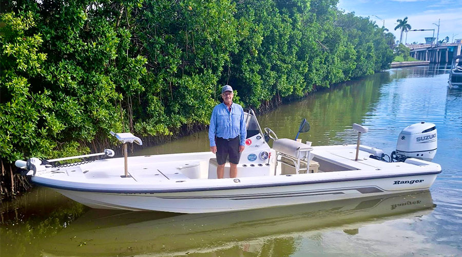 Captian Kelly Stilwell aboard his 2400 Bay Ranger.
